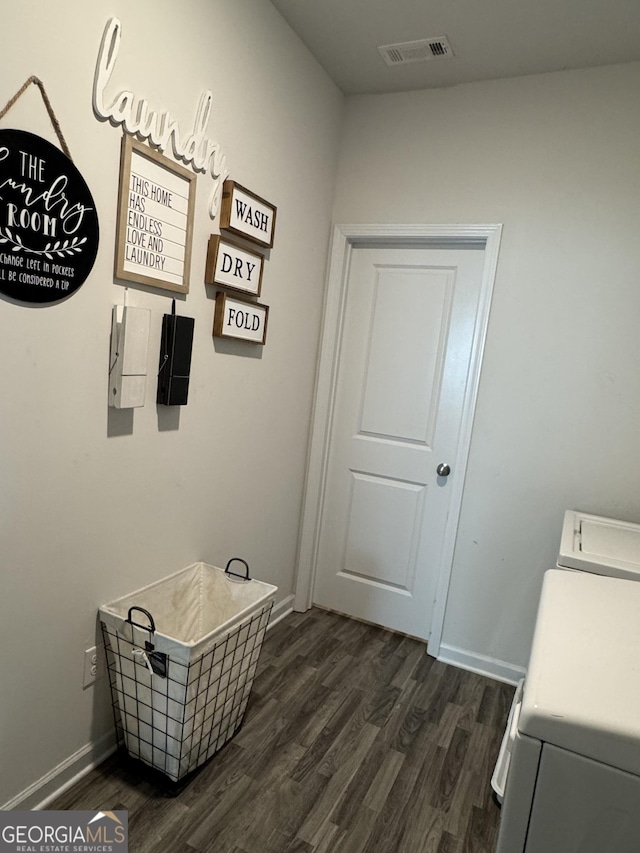 5257 Shorthorn Way, Powder Springs, GA 30127 - laundry area with dark wood-style floors and washer and dryer