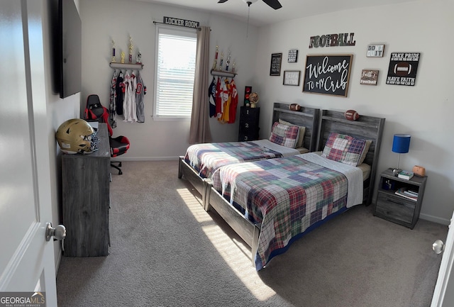 5257 Shorthorn Way, Powder Springs, GA 30127 - carpeted bedroom featuring baseboards and a ceiling fan