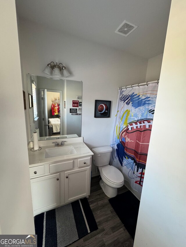 5257 Shorthorn Way, Powder Springs, GA 30127 - ensuite bathroom with vanity and wood finished floors