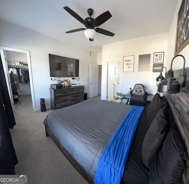 5257 Shorthorn Way, Powder Springs, GA 30127 - bedroom featuring carpet floors, a walk in closet, a ceiling fan, and a closet