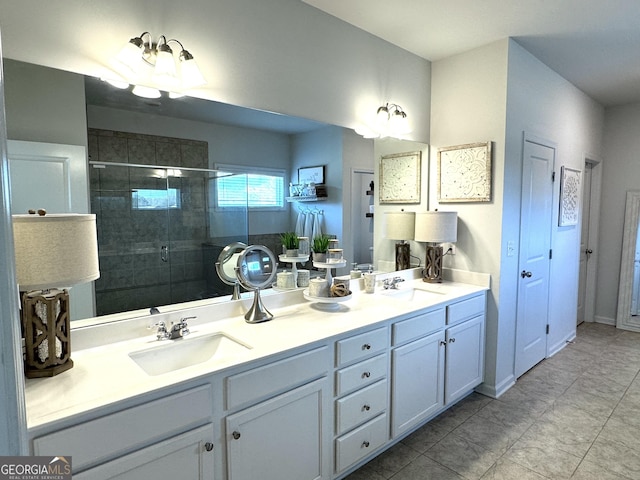 5257 Shorthorn Way, Powder Springs, GA 30127 - bathroom featuring double vanity, a shower stall, and tile patterned floors