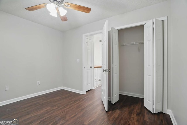 46 Highland Ct, Carrollton, GA 30116 - unfurnished bedroom featuring wood finished floors, a closet, and a ceiling fan