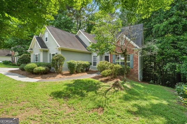 46 Highland Ct, Carrollton, GA 30116 - view of front facade featuring a front lawn and brick siding