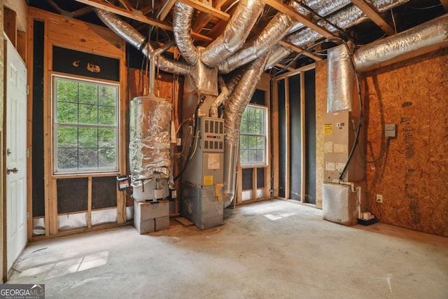 46 Highland Ct, Carrollton, GA 30116 - misc room with water heater, plenty of natural light, and heating unit