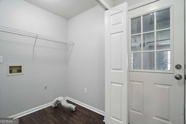 46 Highland Ct, Carrollton, GA 30116 - laundry room with hookup for an electric dryer, dark wood finished floors, hookup for a washing machine, and a textured ceiling