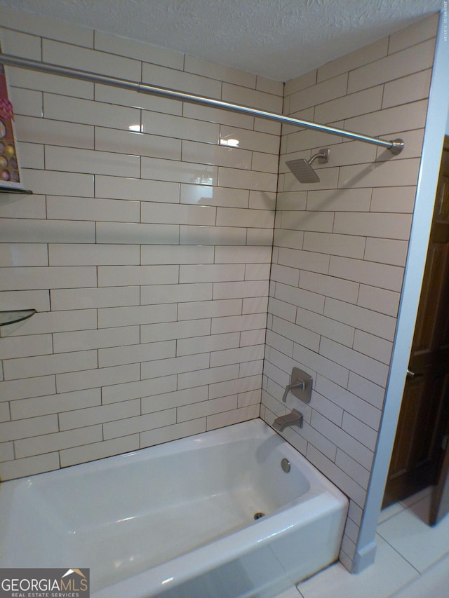 5741 Wolf Laurel Ln SW, Lilburn, GA 30047 - full bath with a textured ceiling and  shower combination