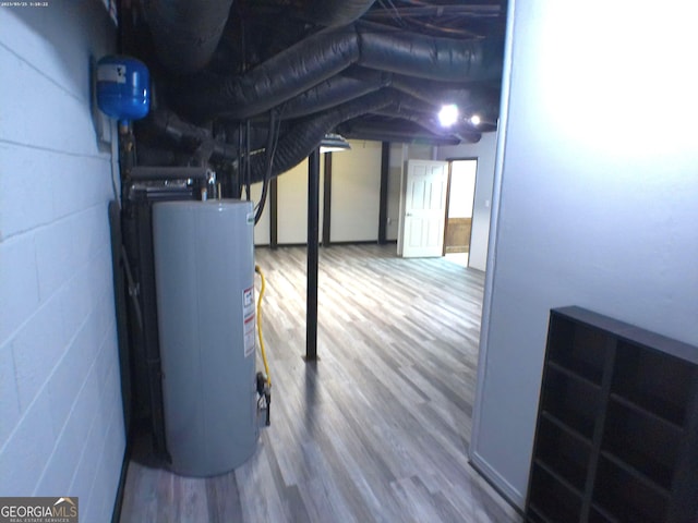 5741 Wolf Laurel Ln SW, Lilburn, GA 30047 - unfinished below grade area with gas water heater and wood finished floors