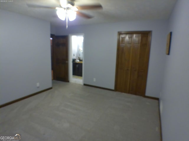 5741 Wolf Laurel Ln SW, Lilburn, GA 30047 - unfurnished bedroom featuring carpet and ceiling fan