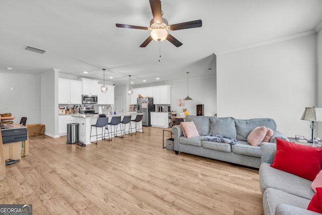 5615 Parkview Ln, Flowery Branch, GA 30542 - living room with recessed lighting, ornamental molding, a ceiling fan, and light wood-style floors
