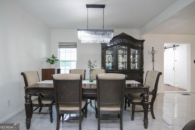 711 Main St, Byron, GA 31008 - dining space with a chandelier and baseboards