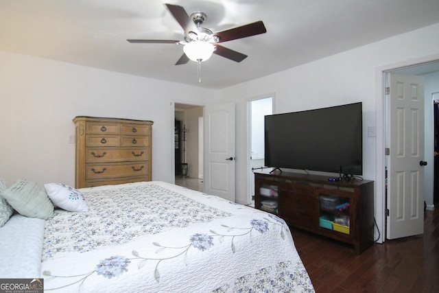 711 Main St, Byron, GA 31008 - bedroom with dark wood-type flooring and ceiling fan
