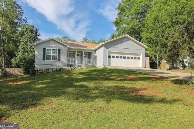 711 Main St, Byron, GA 31008 - ranch-style house with covered porch, concrete driveway, and an attached garage