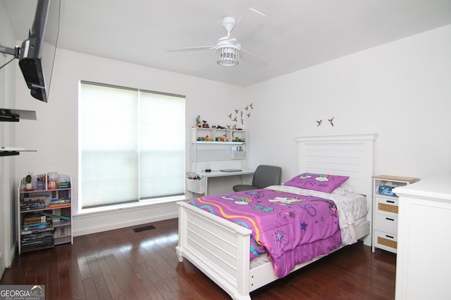 711 Main St, Byron, GA 31008 - bedroom with hardwood / wood-style flooring and a ceiling fan