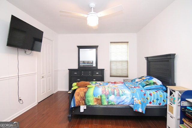 711 Main St, Byron, GA 31008 - bedroom with dark wood finished floors and a ceiling fan