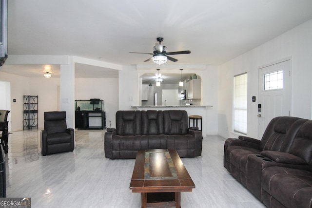 711 Main St, Byron, GA 31008 - living area with ceiling fan