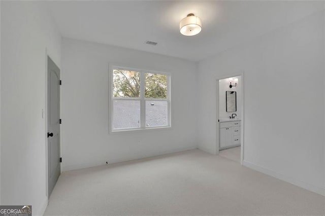 830 Gaston St SW, Atlanta, GA 30310 - unfurnished bedroom with light carpet and connected bathroom
