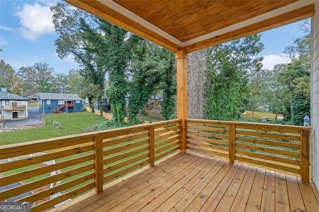 830 Gaston St SW, Atlanta, GA 30310 - wooden deck with a lawn and view of wooded area