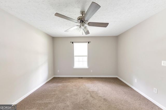 400 Rustin Dr, Dallas, GA 30157 - empty room with a ceiling fan, a textured ceiling, and carpet flooring