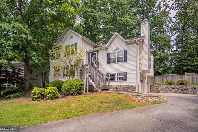 962 Taylors Farm Ct, Canton, GA 30115 - view of front of house featuring driveway, a chimney, stairs, an attached garage, and stone siding