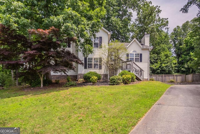 962 Taylors Farm Ct, Canton, GA 30115 - view of front of home featuring a chimney, driveway, and stairway