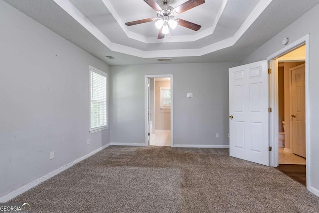 962 Taylors Farm Ct, Canton, GA 30115 - unfurnished bedroom featuring a raised ceiling, carpet flooring, and ceiling fan