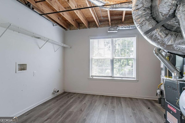 962 Taylors Farm Ct, Canton, GA 30115 - laundry room featuring light wood-type flooring, plenty of natural light, hookup for a washing machine, and heating unit