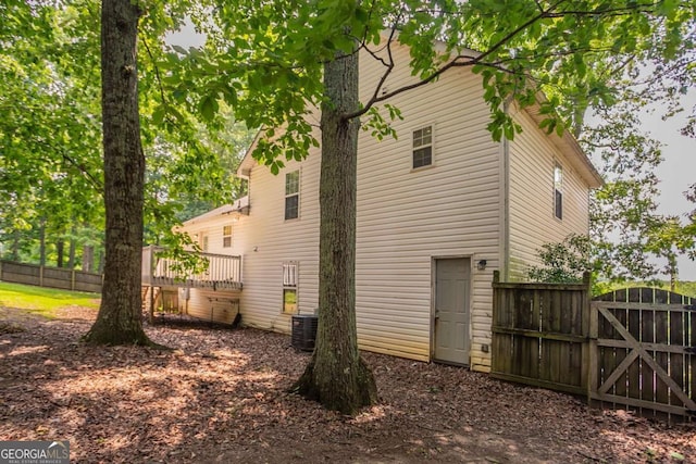 962 Taylors Farm Ct, Canton, GA 30115 - rear view of house with a gate and a deck