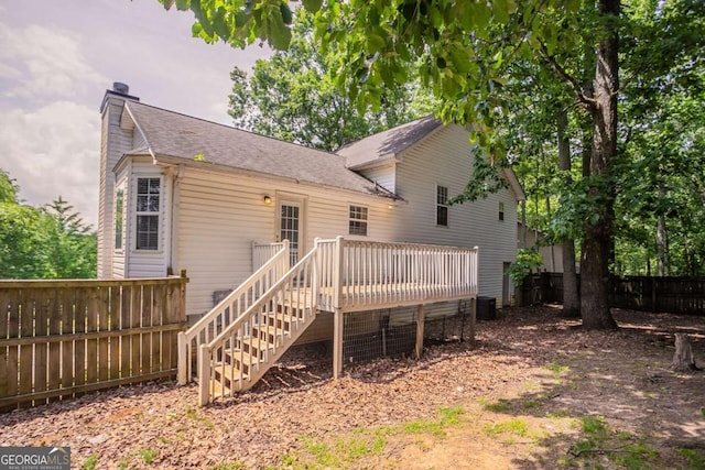 962 Taylors Farm Ct, Canton, GA 30115 - rear view of house with a chimney, a deck, a shingled roof, and stairway