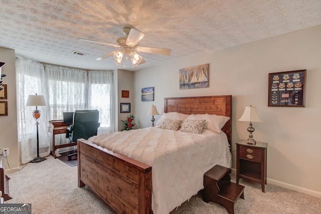253 Lakeview Bend Cir, Jefferson, GA 30549 - bedroom with light colored carpet, ceiling fan, and a textured ceiling