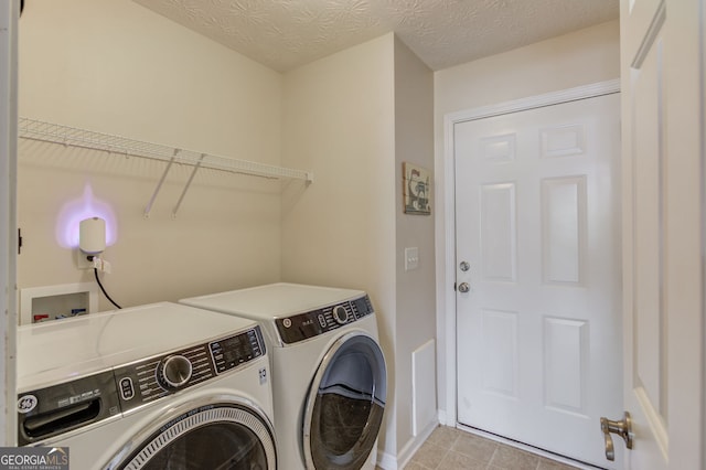 253 Lakeview Bend Cir, Jefferson, GA 30549 - washroom with washing machine and dryer and light tile patterned floors