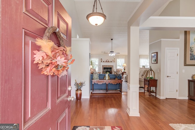253 Lakeview Bend Cir, Jefferson, GA 30549 - entrance foyer with light wood-style flooring, a fireplace, and ceiling fan