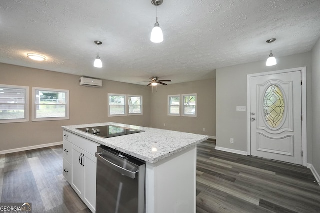 118 Turtle Cove Trwy, Monticello, GA 31064 - kitchen with black electric cooktop, an AC wall unit, stainless steel dishwasher, a textured ceiling, and dark wood-style flooring