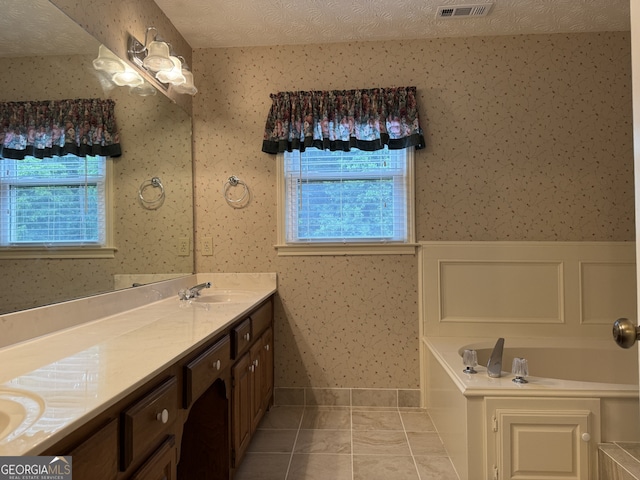 25 Darcee Ct, Lawrenceville, GA 30046 - full bathroom with double vanity, wallpapered walls, tile patterned floors, a garden tub, and a wainscoted wall