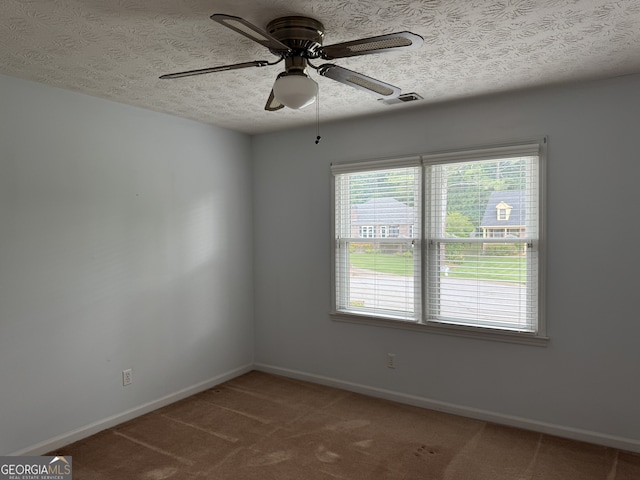 25 Darcee Ct, Lawrenceville, GA 30046 - carpeted empty room featuring a textured ceiling and a ceiling fan