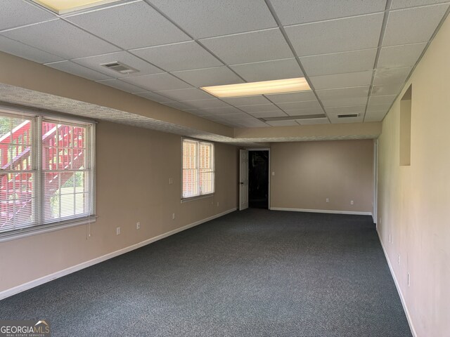 25 Darcee Ct, Lawrenceville, GA 30046 - unfurnished room featuring a paneled ceiling and dark carpet