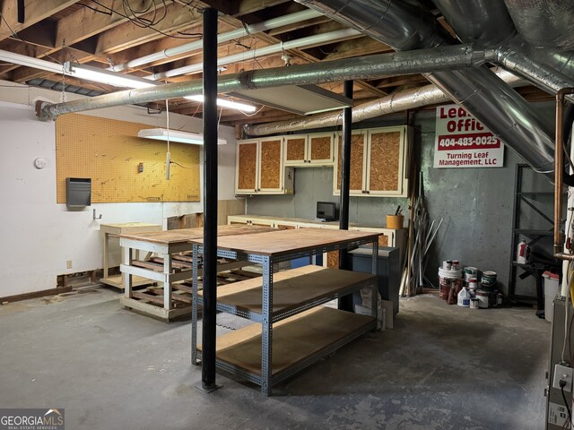 25 Darcee Ct, Lawrenceville, GA 30046 - unfinished basement with a workshop area