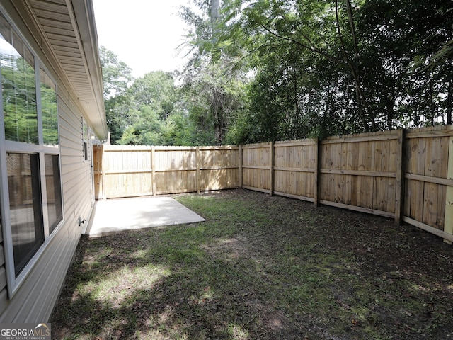 13 Pine Shadow Ct, Centerville, GA 31028 - fenced backyard with a patio