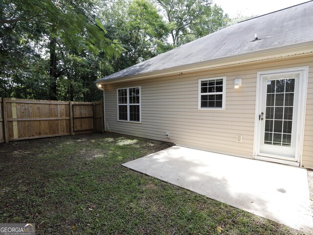 13 Pine Shadow Ct, Centerville, GA 31028 - back of house with a patio and a shingled roof