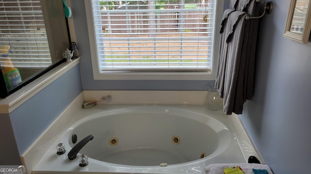 223 Overland Trl, Mcdonough, GA 30252 - full bath with plenty of natural light and a jetted tub