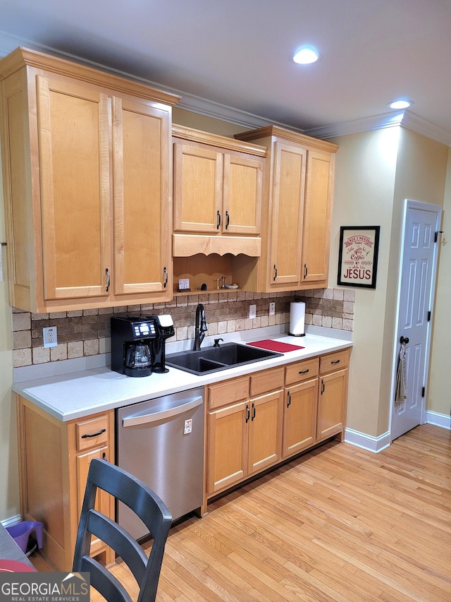 223 Overland Trl, Mcdonough, GA 30252 - kitchen featuring stainless steel dishwasher, crown molding, tasteful backsplash, light wood-type flooring, and light countertops