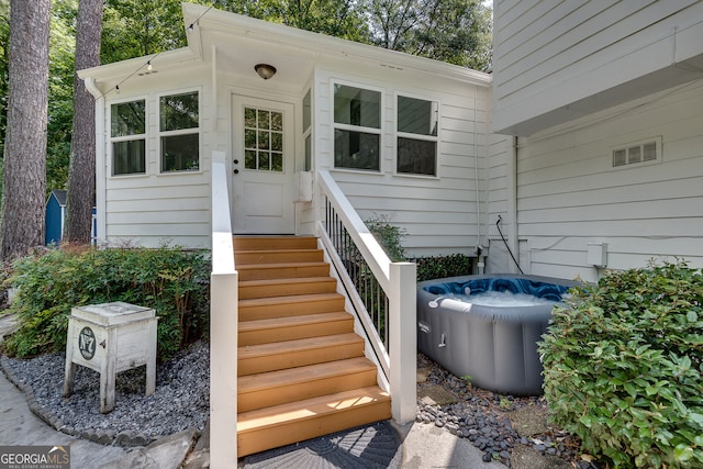 2716 Meadow Ridge Dr NW, Duluth, GA 30096 - view of exterior entry featuring a hot tub