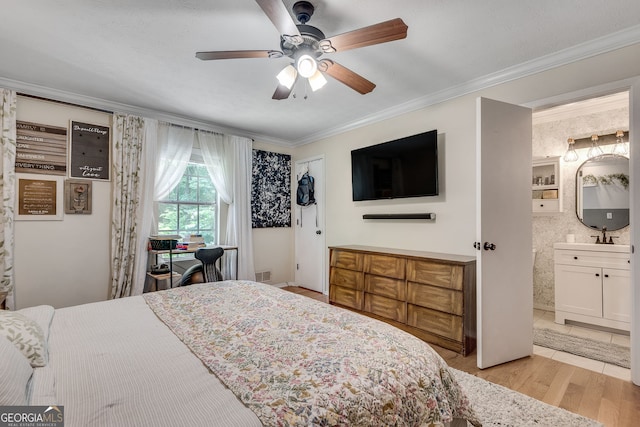 2716 Meadow Ridge Dr NW, Duluth, GA 30096 - bedroom with ornamental molding, light wood-style flooring, ceiling fan, and ensuite bath