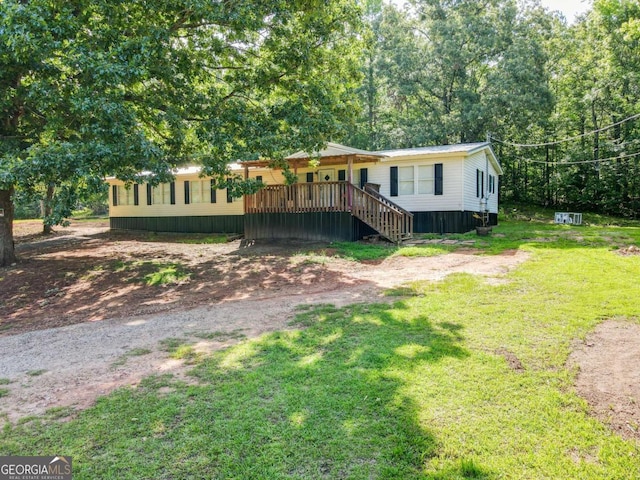 381 Jim Turner Rd, West Point, GA 31833 - manufactured / mobile home featuring a front lawn and stairway