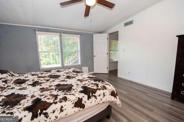 381 Jim Turner Rd, West Point, GA 31833 - bedroom with lofted ceiling, wood finished floors, and a ceiling fan