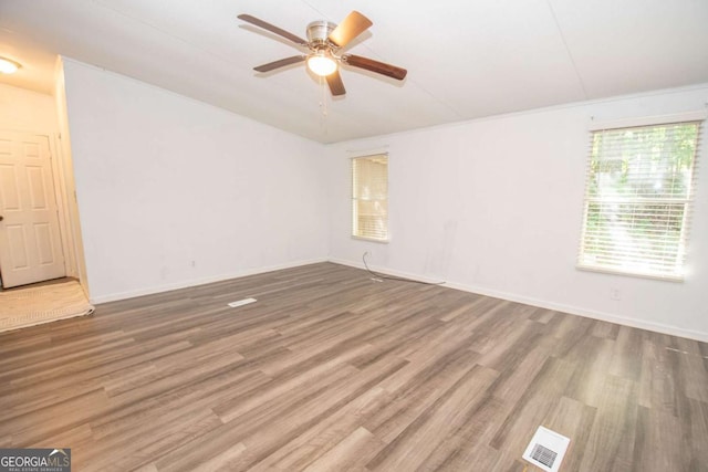 381 Jim Turner Rd, West Point, GA 31833 - spare room with a ceiling fan and wood finished floors