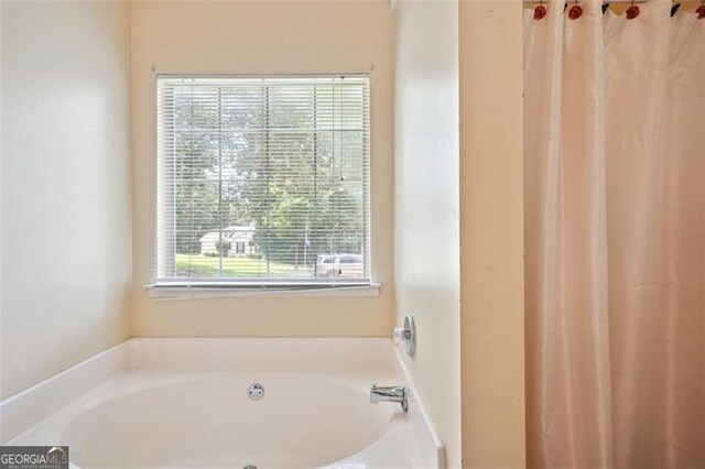 408 Victoria Place Dr, Locust Grove, GA 30248 - bathroom featuring a bath