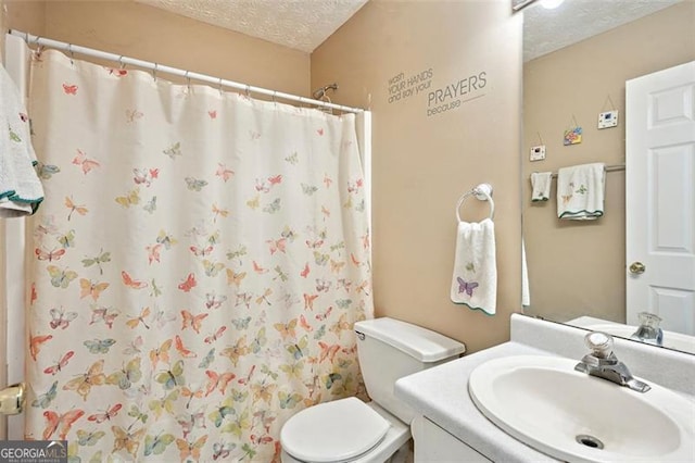 408 Victoria Place Dr, Locust Grove, GA 30248 - bathroom featuring a textured ceiling, vanity, and curtained shower