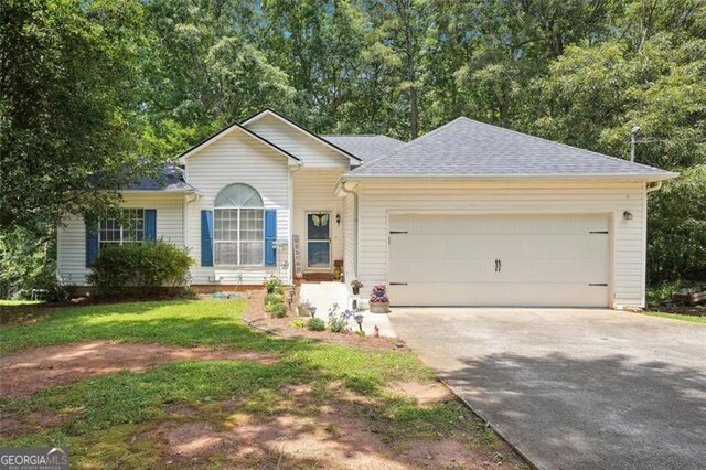 408 Victoria Place Dr, Locust Grove, GA 30248 - single story home featuring a garage, driveway, and roof with shingles