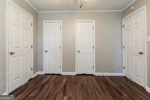 3993 Forrest Ct, Atlanta, GA 30341 - unfurnished bedroom featuring dark wood-type flooring and ornamental molding