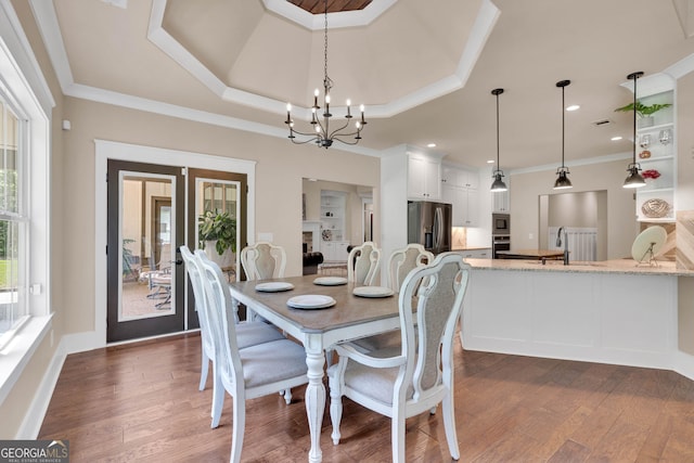 35 Cornish Creek Ln, Covington, GA 30014 - dining room featuring wood finished floors, ornamental molding, a chandelier, and recessed lighting